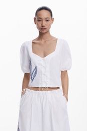 Blousemetgeborduurdepofmouwen