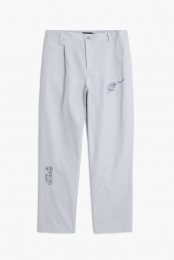 Langebroektailormetborduursels