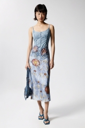 Mouwloosjurkvantweematerialen