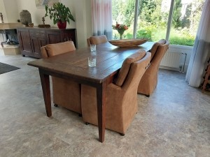 Setvan4lereneetkamerfauteuils-metarmleuningenwieltjes-bruinleer-EchtleerLandelijkontdekdeveleLeersoortenenKleurenbijShopX
